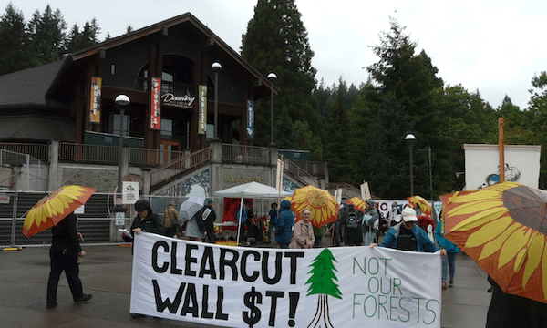 | Climate activists protesting forest biomass outside a conference at the World Forestry Center in Portland Oregon last month WNVNick Englefried | MR Online